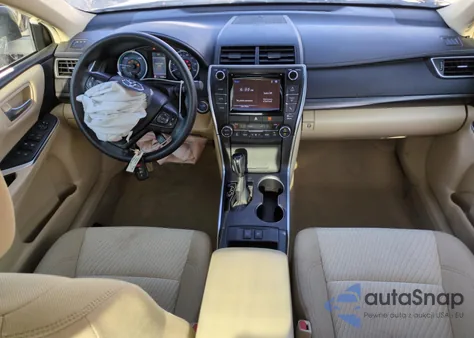 2016 Toyota Camry Hybrid z USA, uszkodzony, nr VIN 4T1BD1FK3GU194808